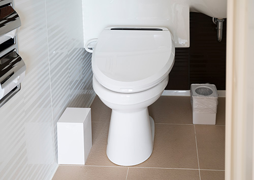 Warm-water bidet-style toilet